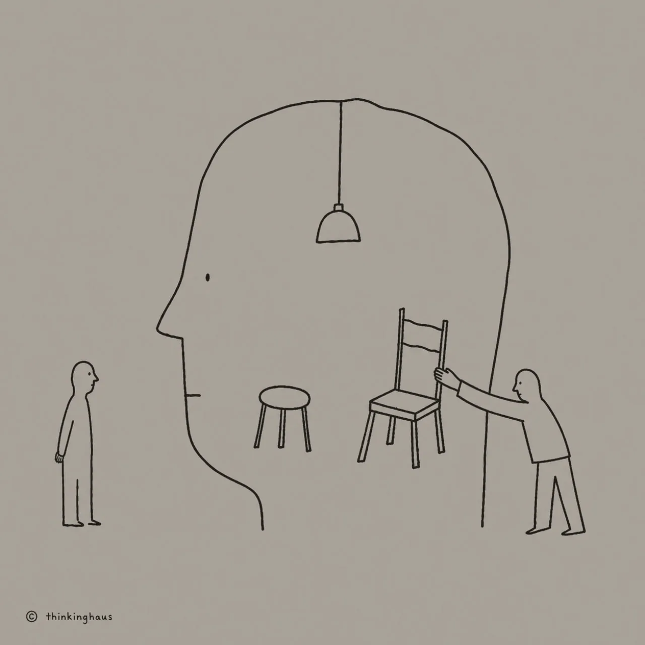 A line drawing of people arranging chairs inside the outline of a head
